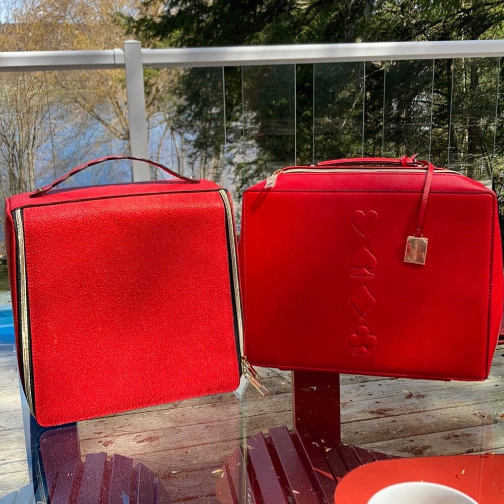 Two new red large Estée Lauder cosmetic bags